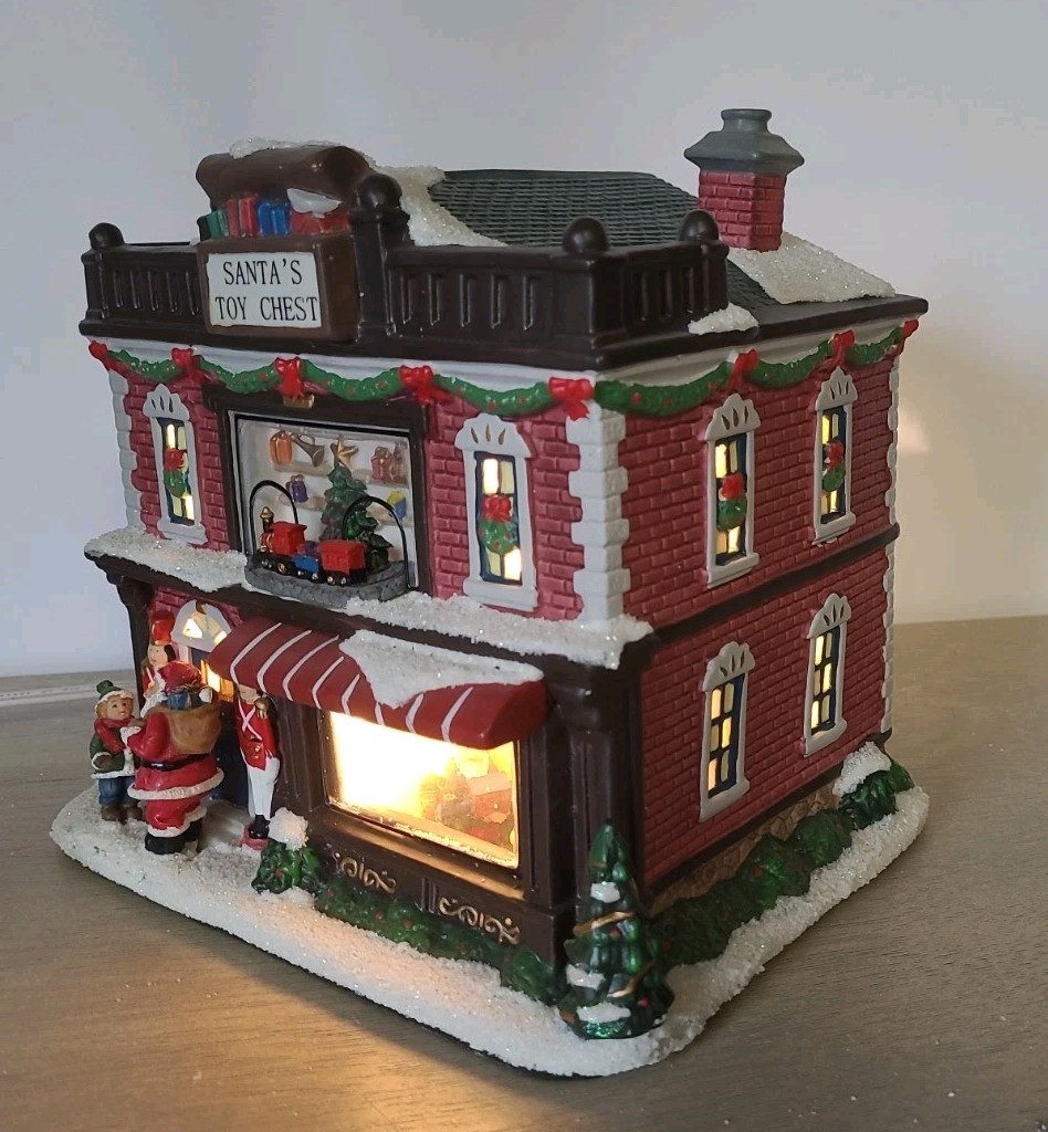St. Nicholas Square Christmas Village 2010 Santa’s Toy Chest Illuminated W/Box