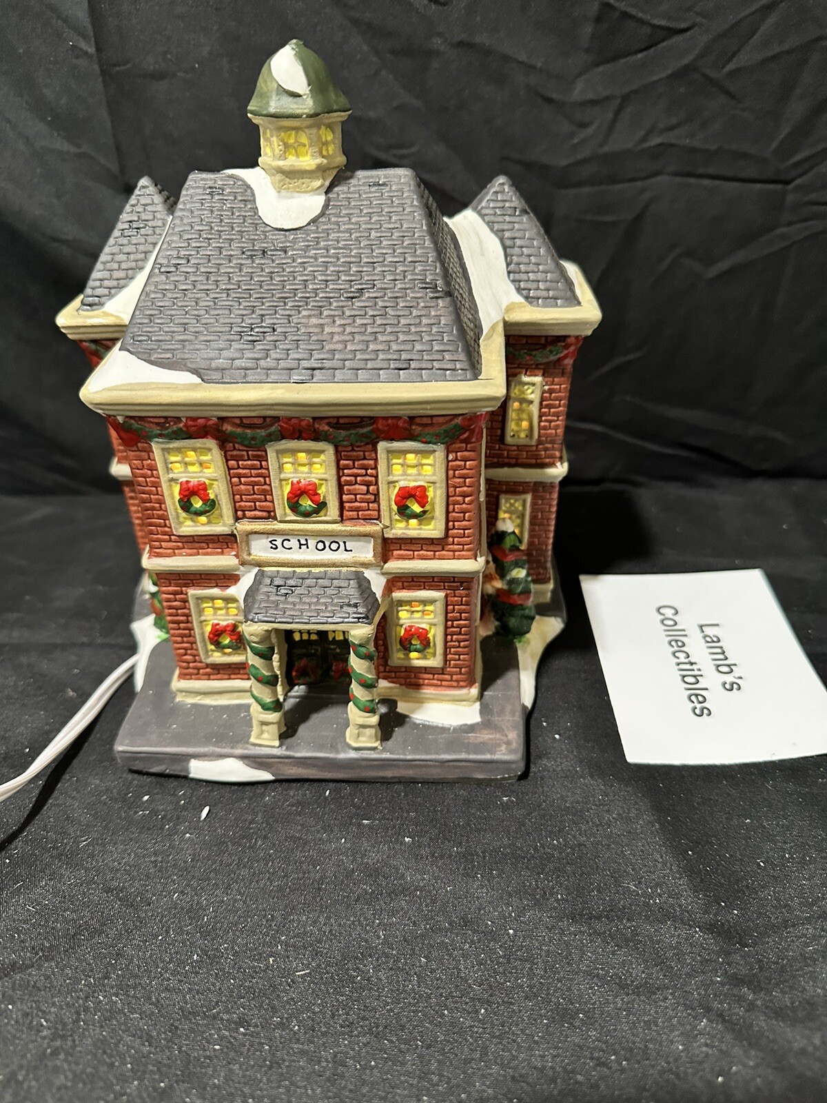Holiday Inspirations Towne Series ceramic Christmas building lights up New Hope