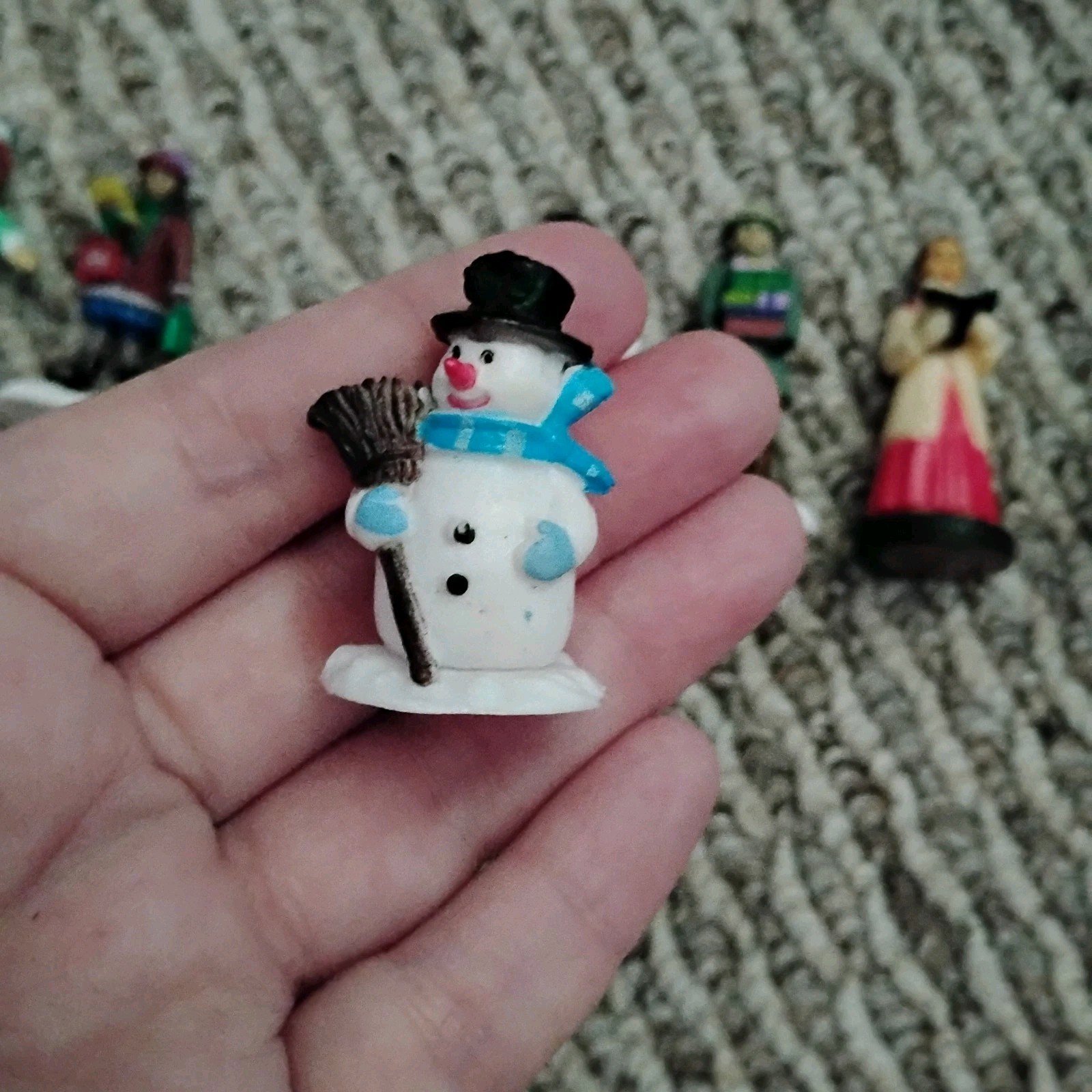 Lot of 7 Miniature Christmas Village Figurines Snowman Carolers People Resin