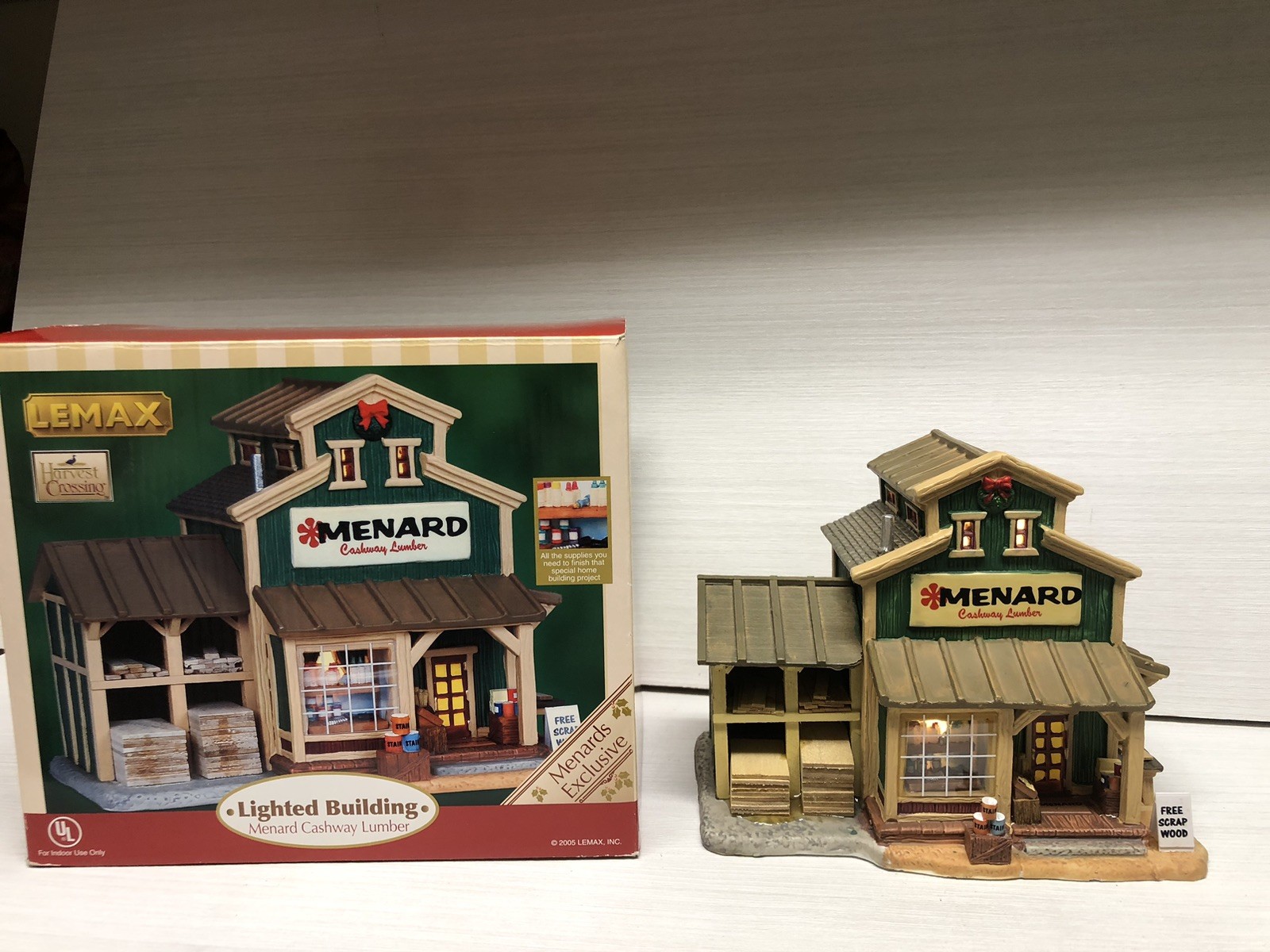 2005 LEMAX Harvest Crossing Lighted “MENARD CASHWAY LUMBER” #55325