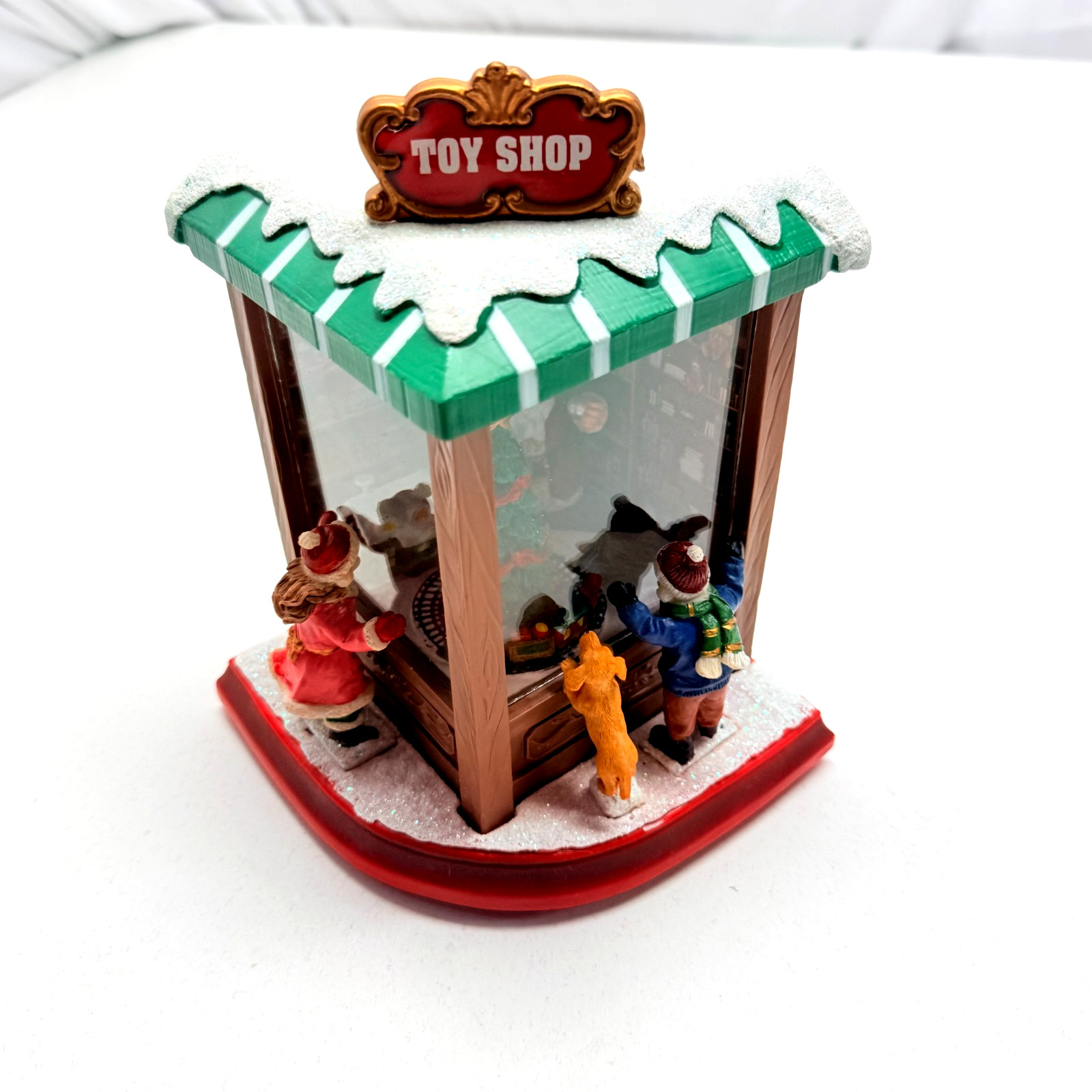 MOMENTS IN TIME Lighted Santa’s Toy Shop (Needs Battery Spring Replaced)