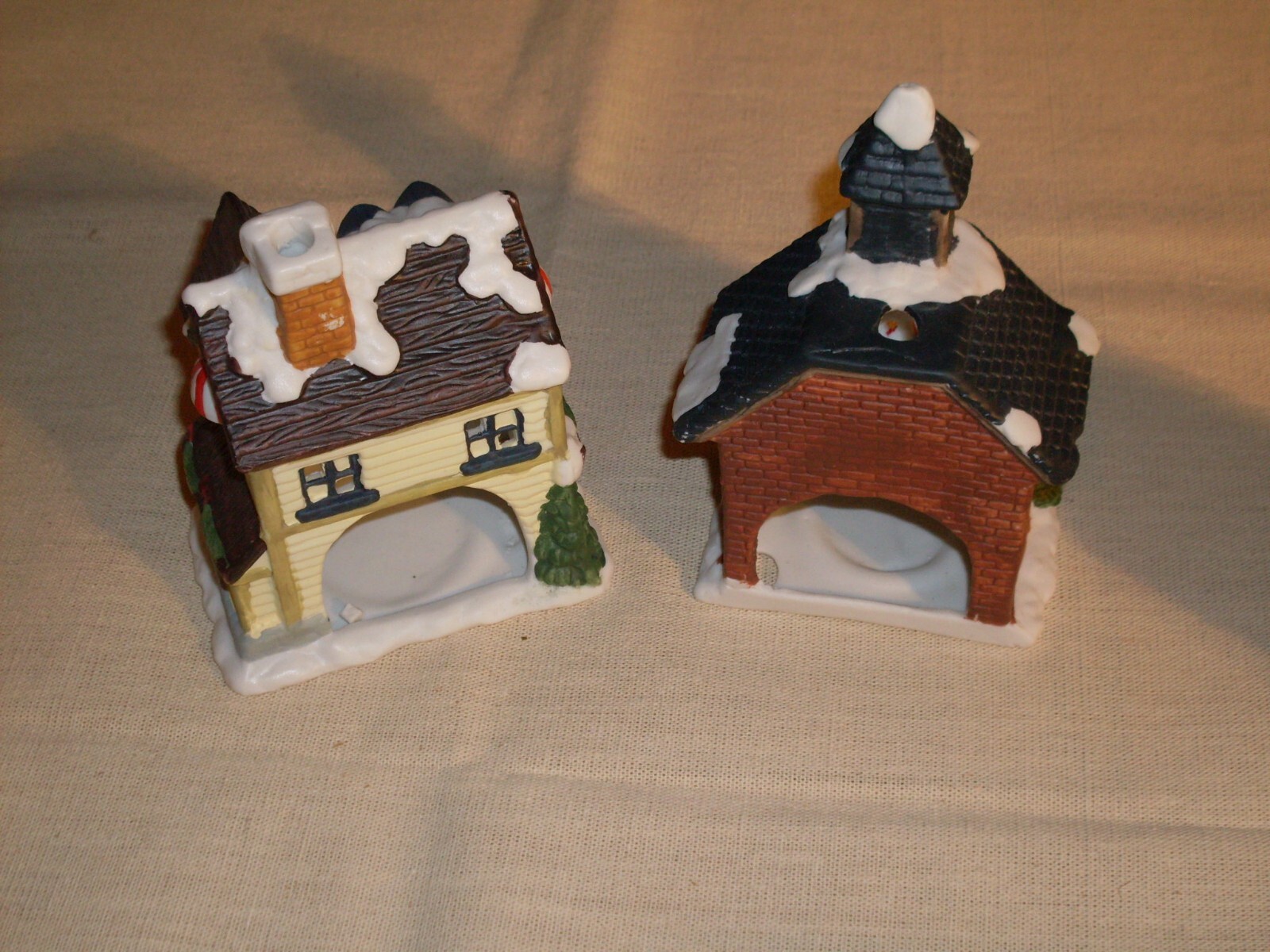 Village Houses. Five colorful, detailed ceramic pieces for display. 4″ tall