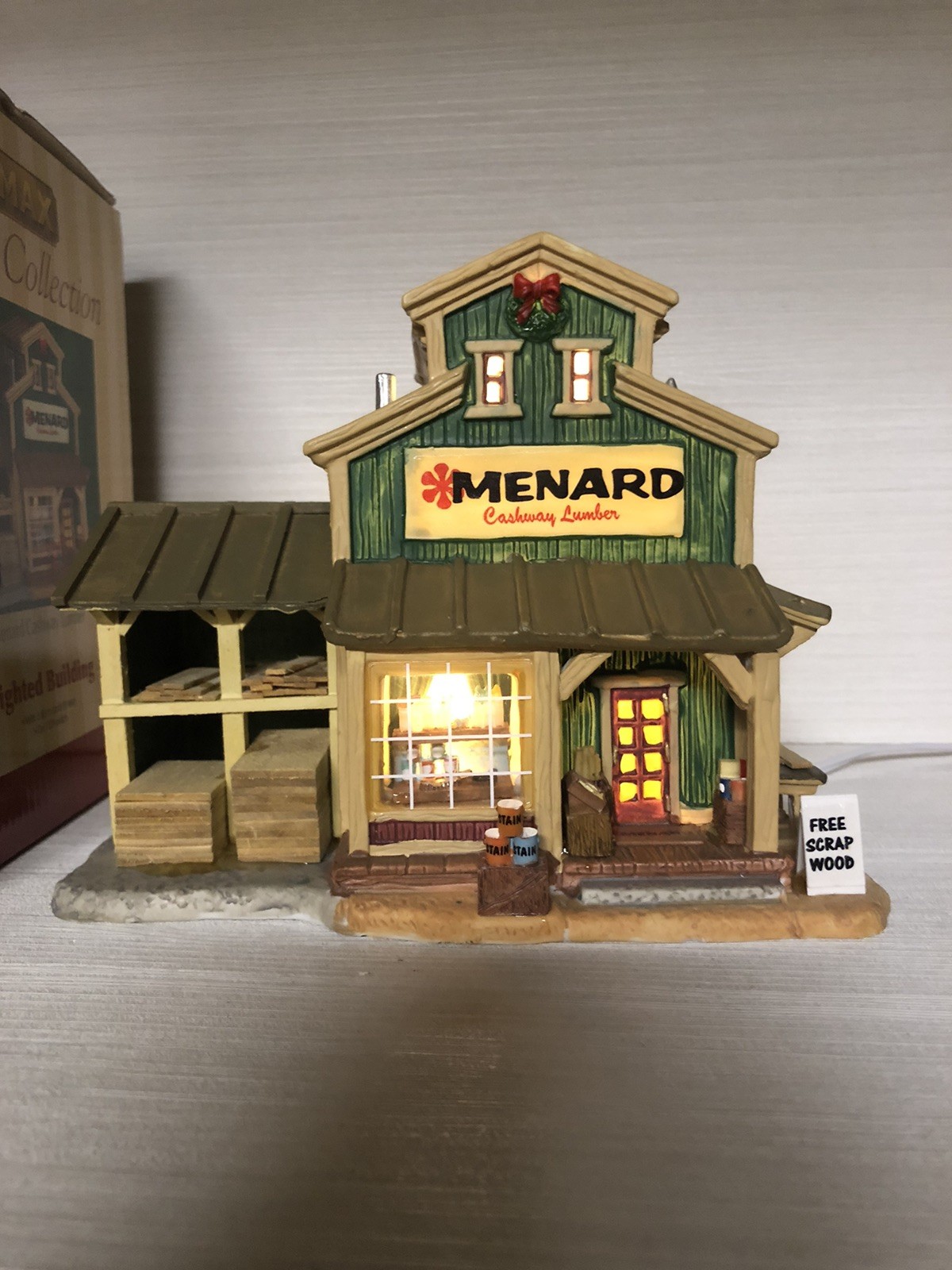 2005 LEMAX Harvest Crossing Lighted “MENARD CASHWAY LUMBER” #55325