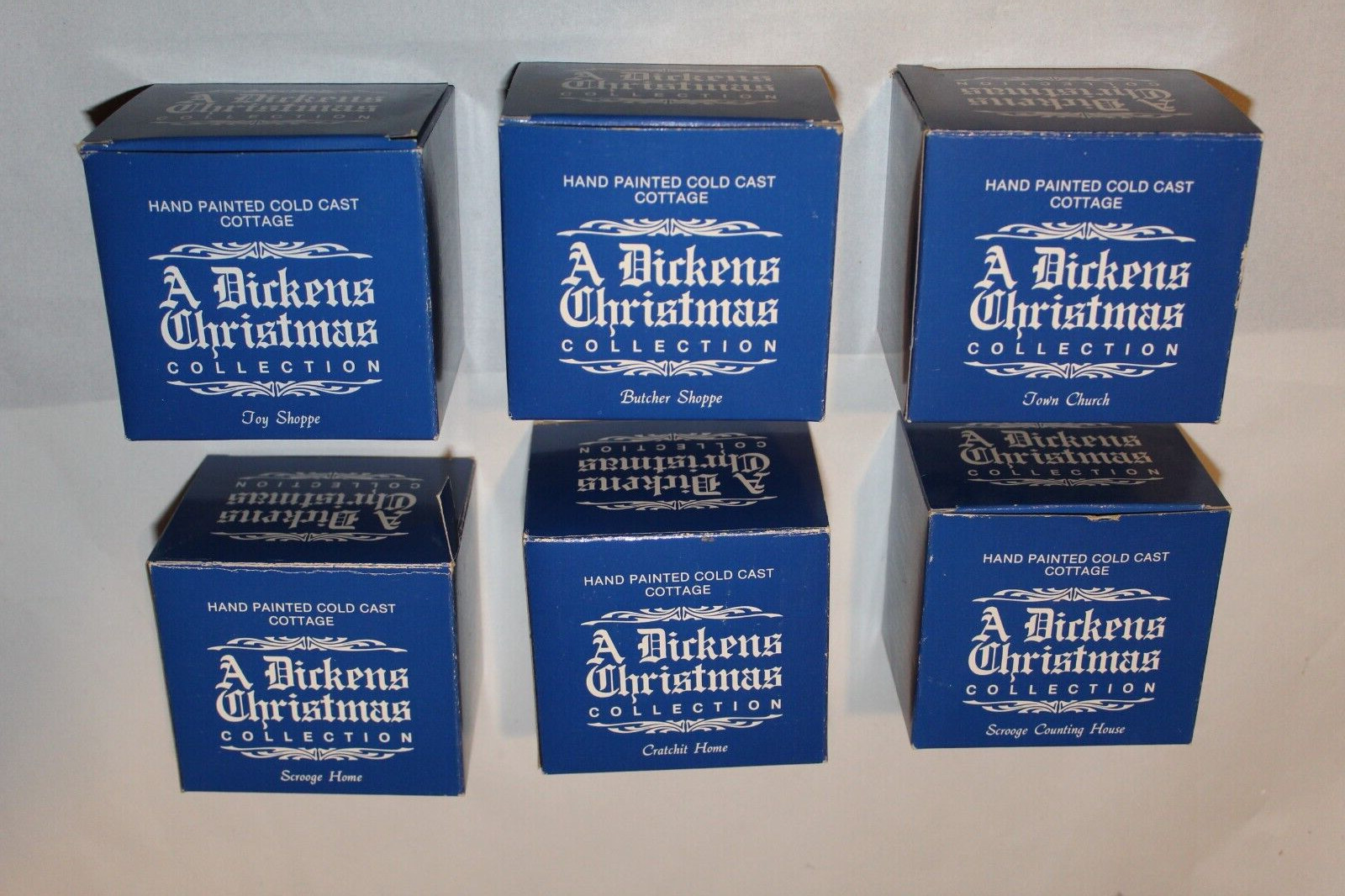 A DICKENS CHRISTMAS COLLECTION 1980’S SET OF SIX MINIATURE BUILDINGS BOXES ONLY