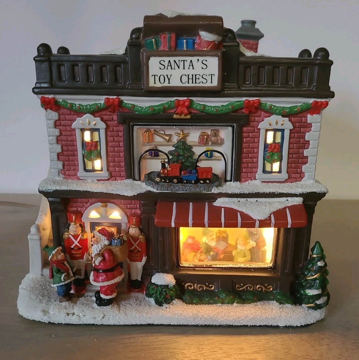 St. Nicholas Square Christmas Village 2010 Santa’s Toy Chest Illuminated W/Box