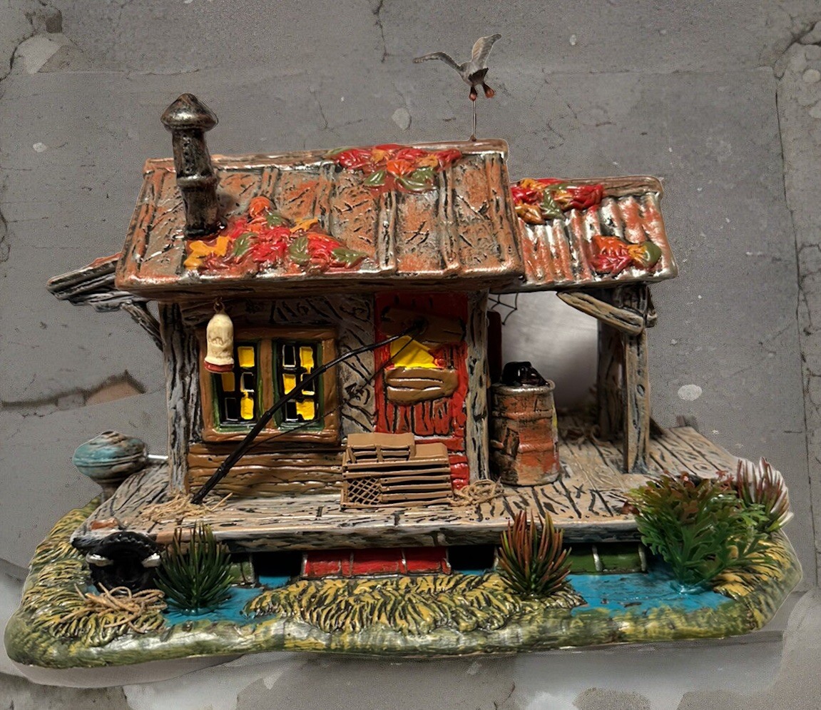 Department 56 Haunted Swamp Shanty 7 inch Decorative House – 6007643