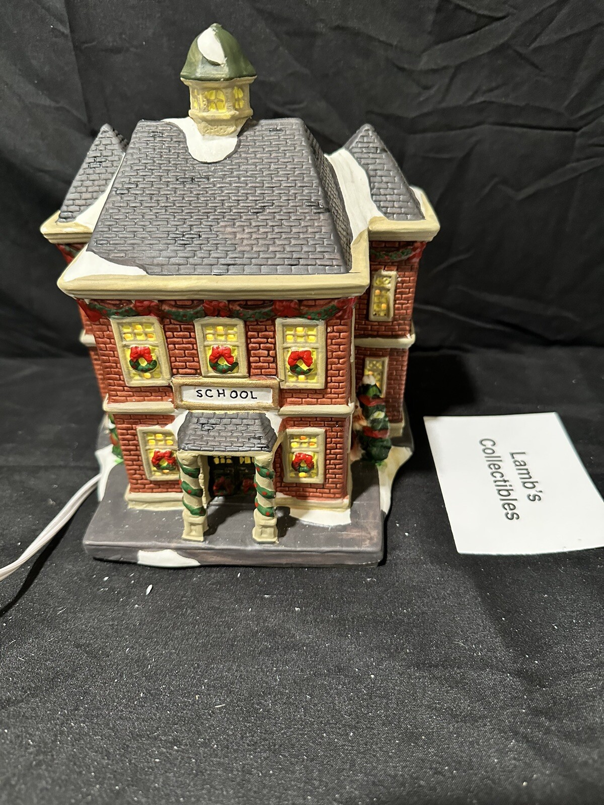 Holiday Inspirations Towne Series ceramic Christmas building lights up New Hope