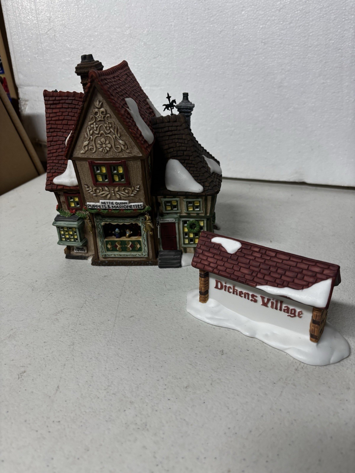 Dept 56 Dickens’ Village Series Nettie Quinn Puppets and Marionettes And Sign