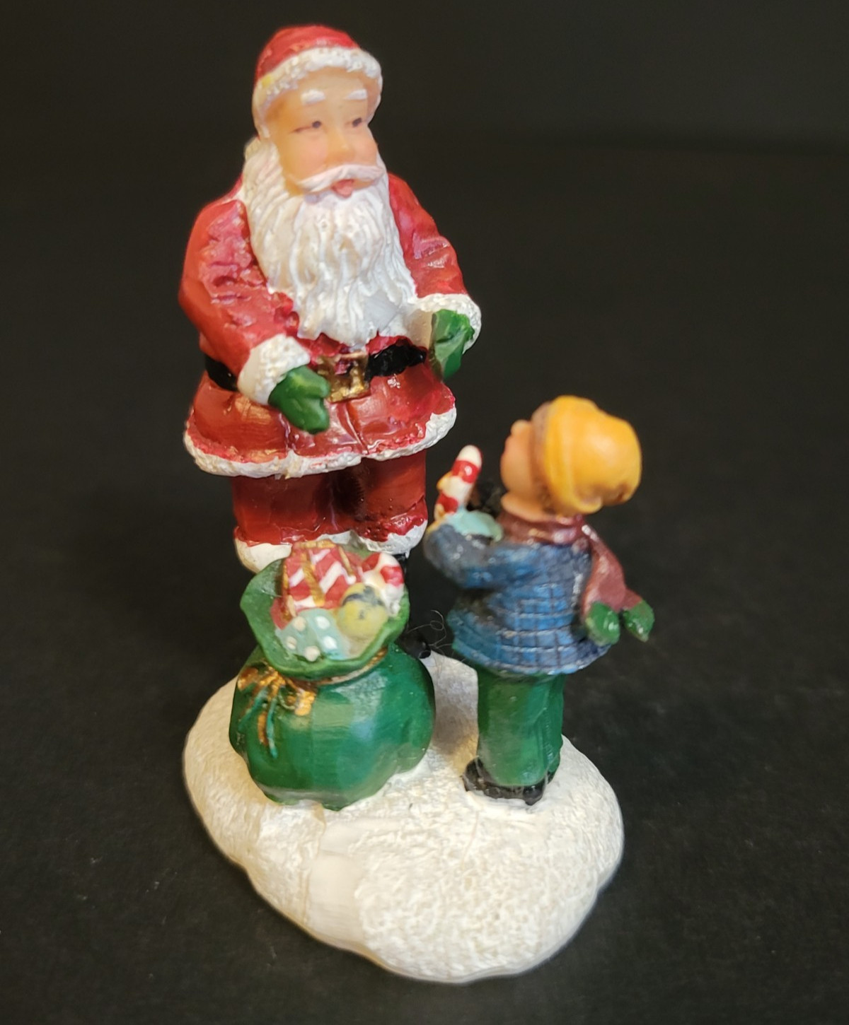 St. Nicholas Square Christmas Village Santa Claus Boy Candy Cane Bag Of Gifts