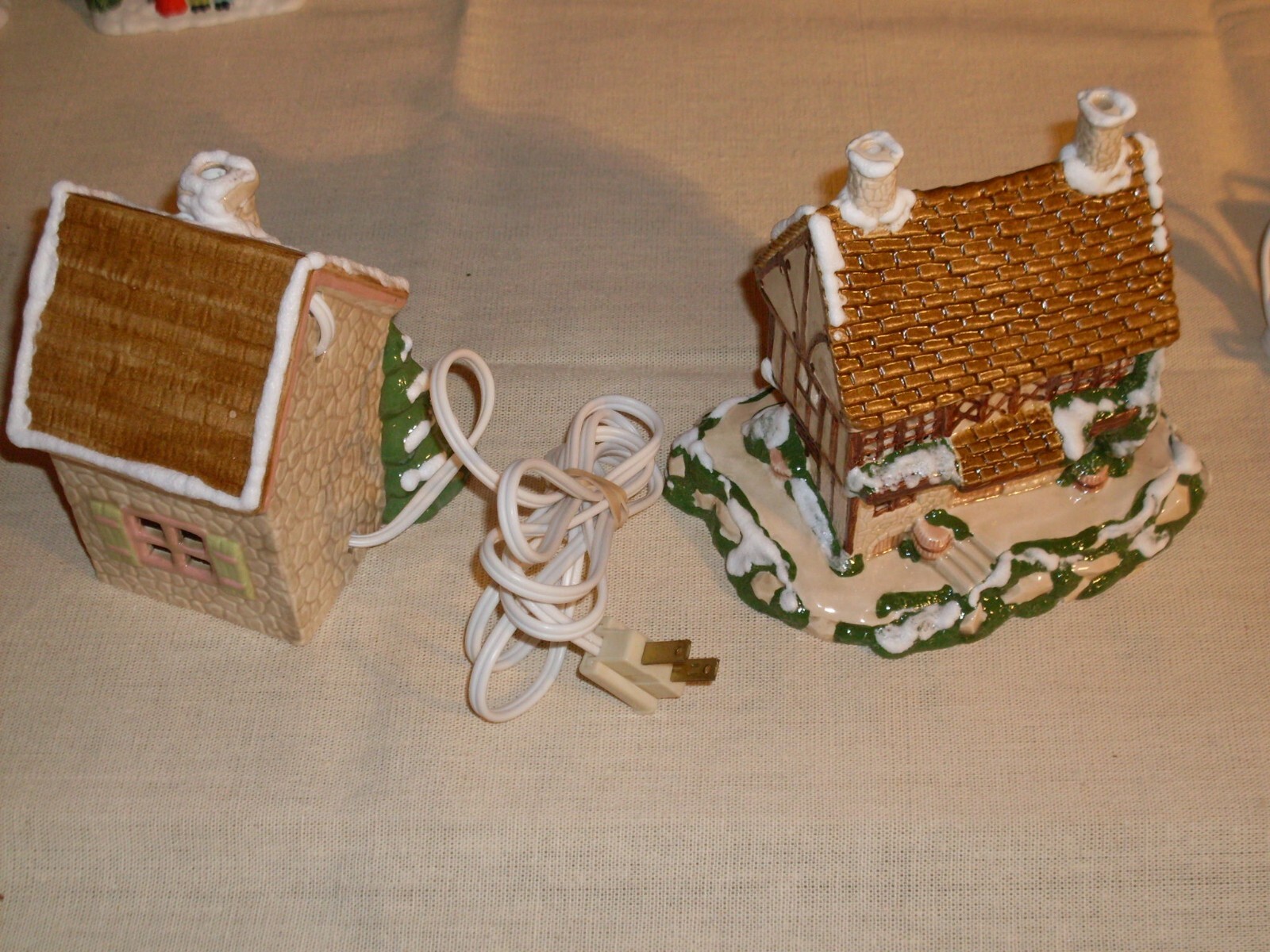 Village Houses. Five colorful, detailed ceramic pieces for display. 4″ tall