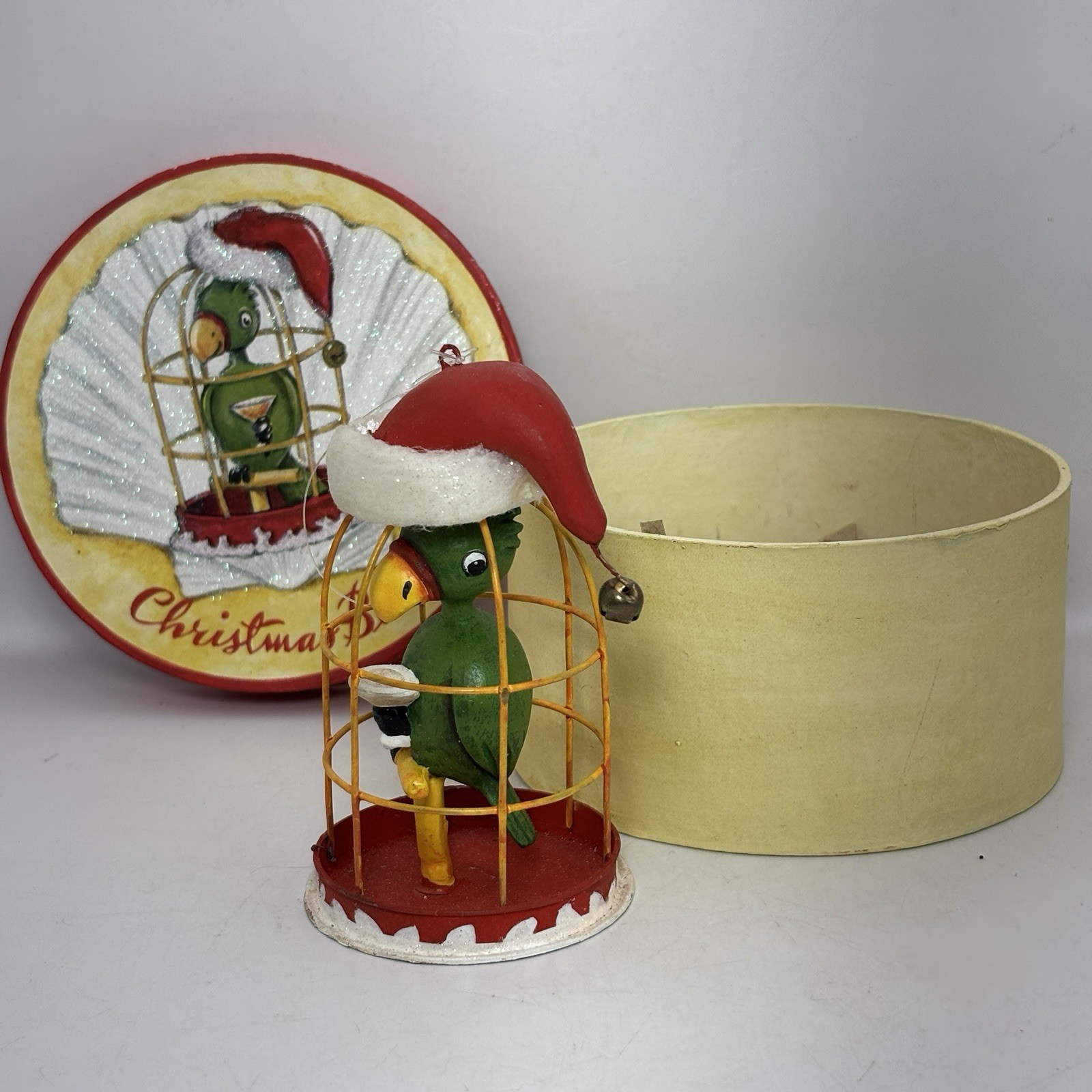 Department 56 – Beach Santa Boxed Parrot Ornament (4″) #95059