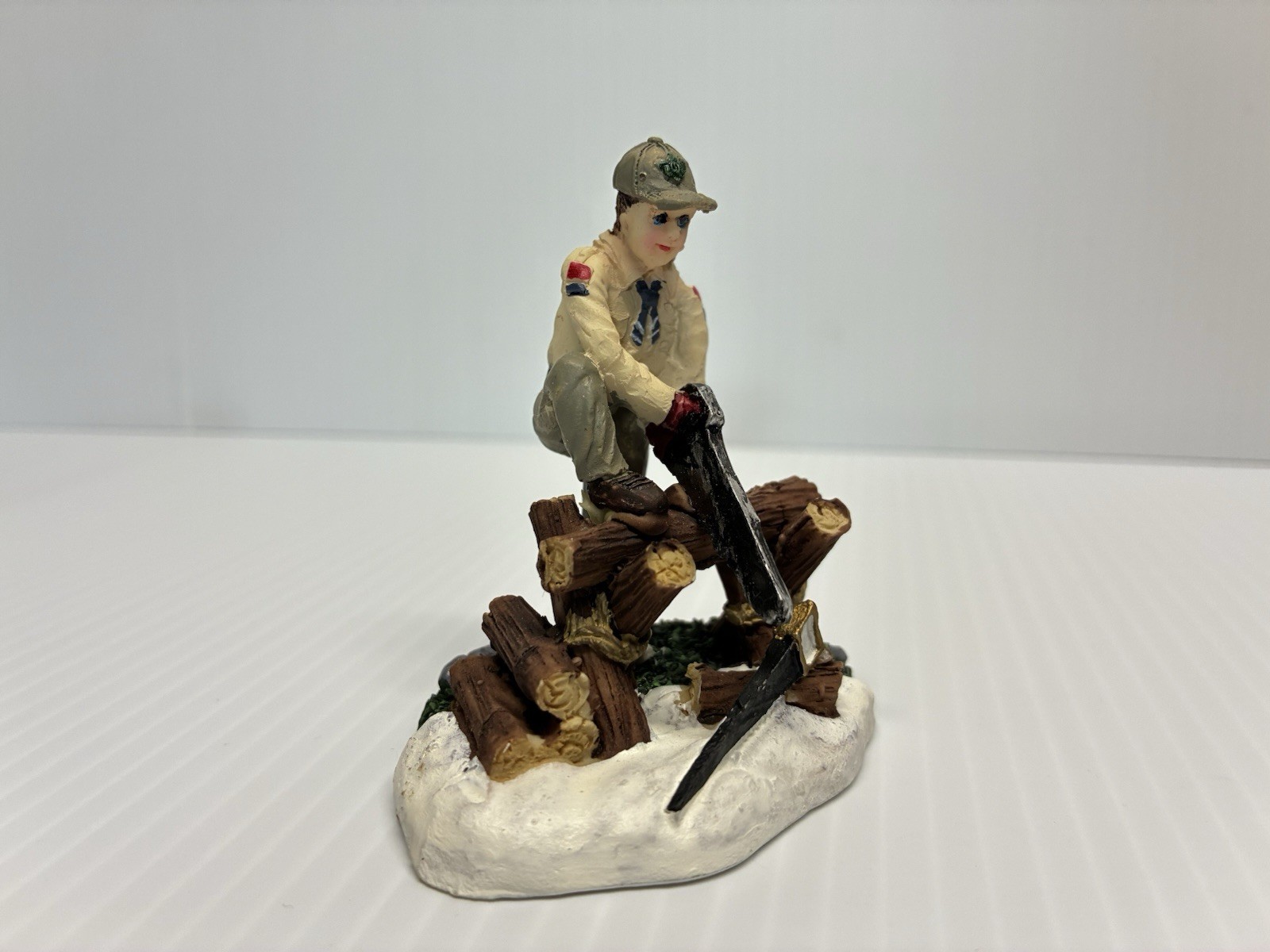 Boy Scouts on Fence, Sawing Wood Christmas Village Accessories Figurine 2013 BSA