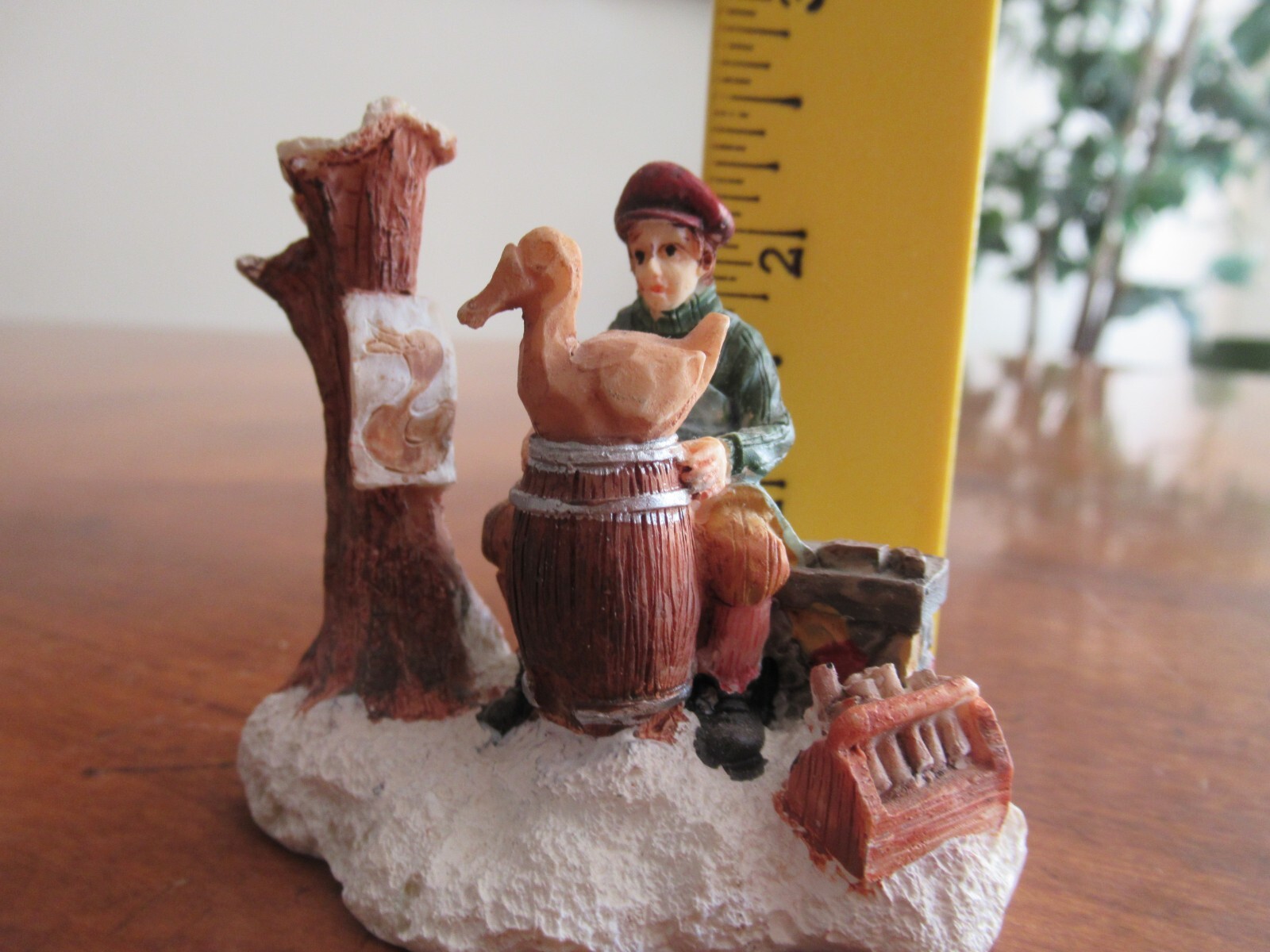 Christmas Village Figurine Resin Man Boy Carving Wooden Duck Barrel Stump 2.4″