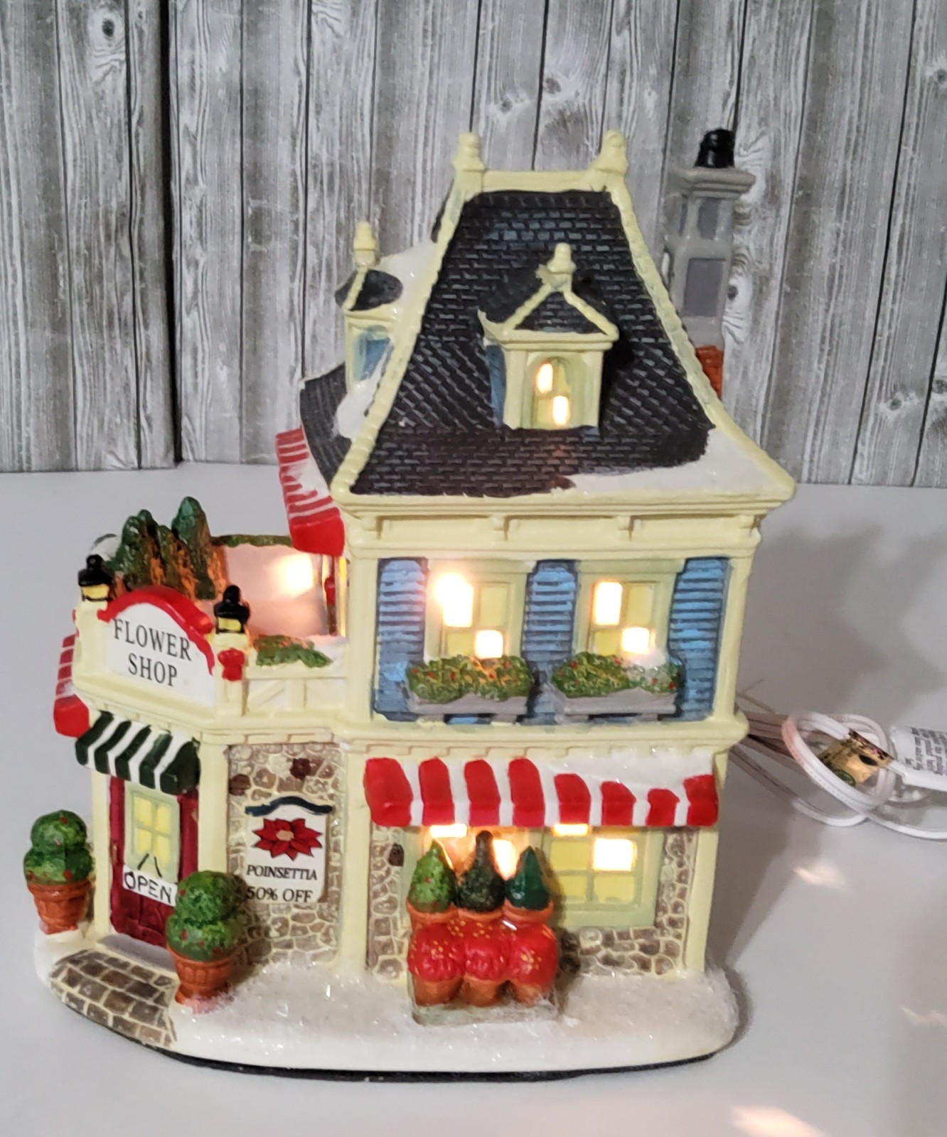 HOLIDAY INSPIRATIONS LIGHTUP ” FLOWER SHOP” VILLAGE HOUSE YEAR 2011