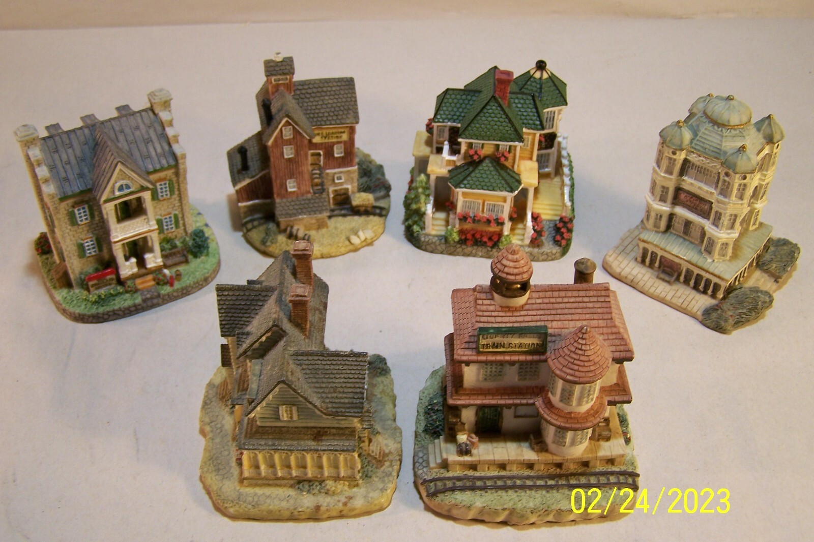 International Resourcing Services Inc–miniature houses-6-v clean