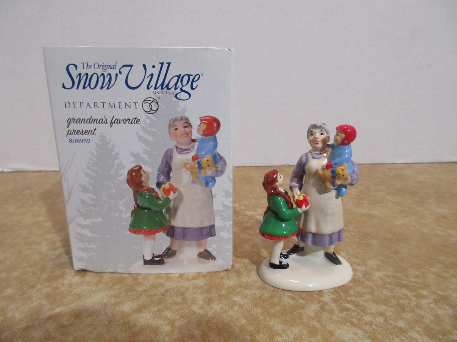 Dept. 56 2002 Snow Village Grandma’s Favorite Present #808952 Grand Children