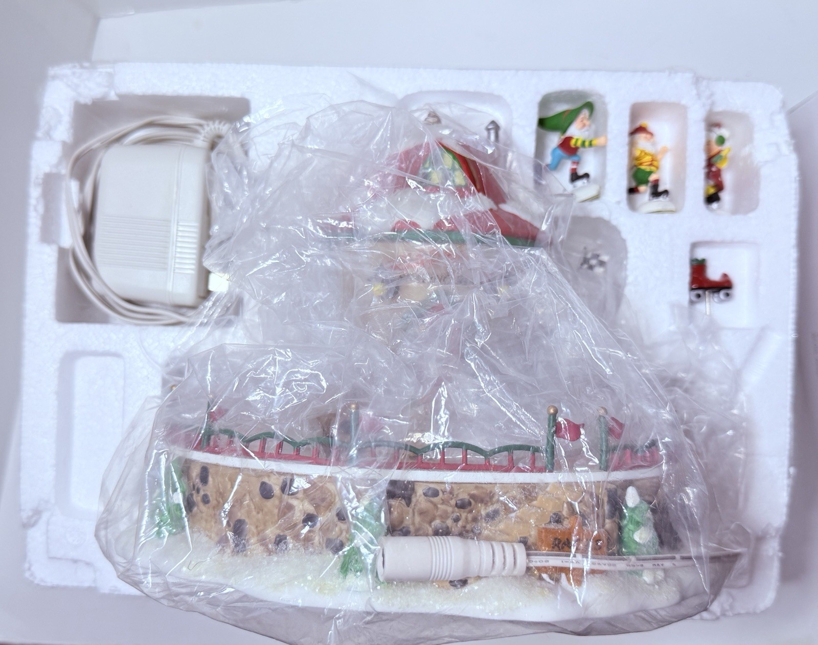 Department 56 North Pole Series Polar Roller Rink Illuminated Christmas Village