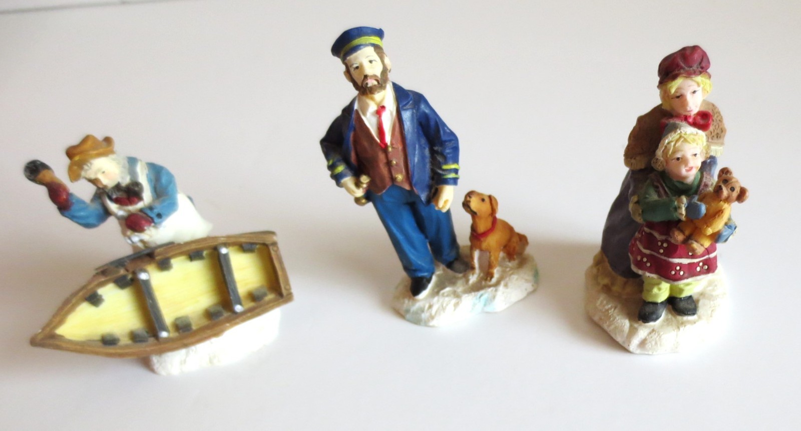 3 CHRISTMAS VILLAGE ACCESSORIES SAILOR FISHERMAN WOMAN AND CHILD WITH TEDDY BEAR
