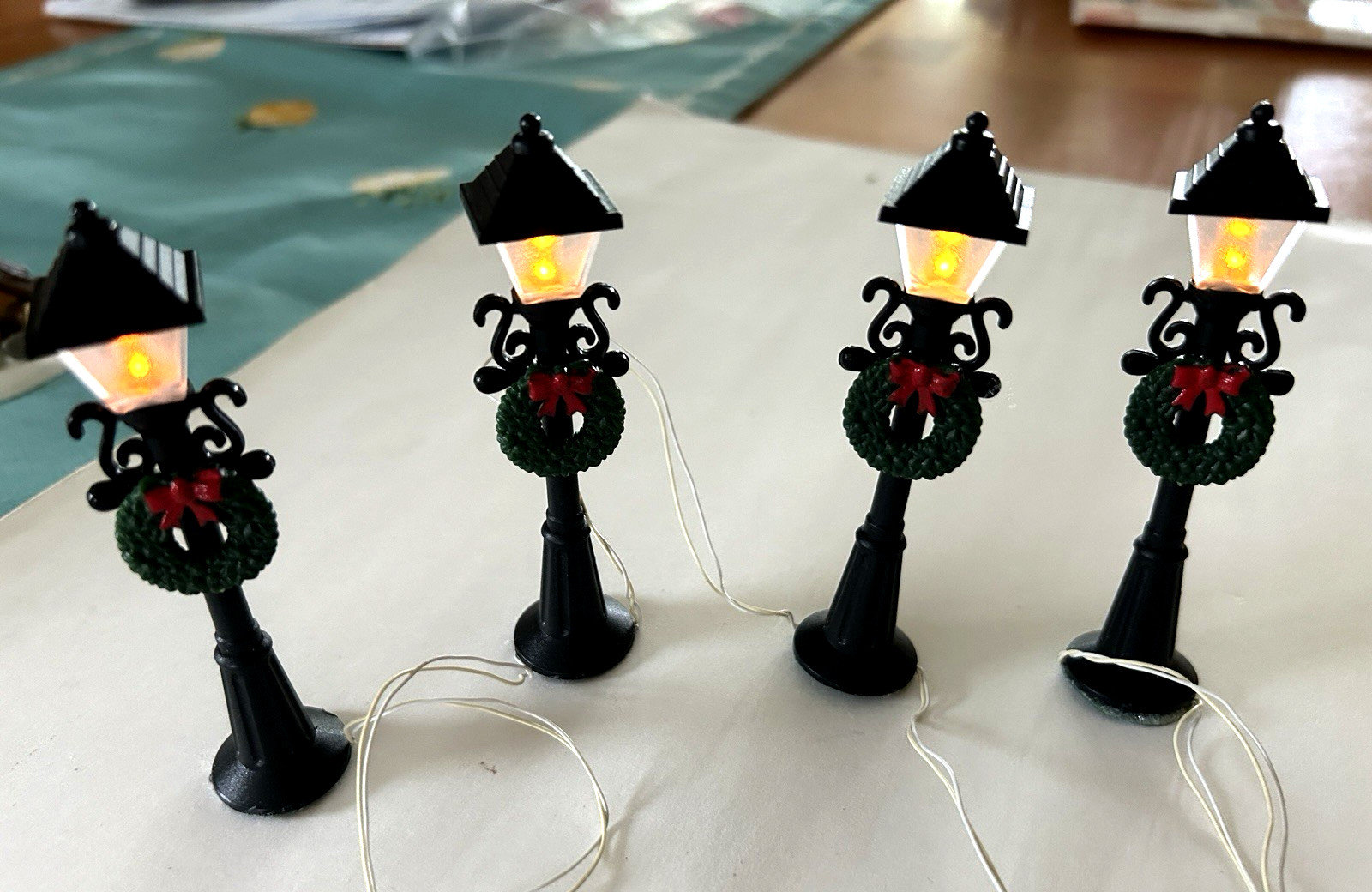 Department 56 Accessories Lit Firepit and Lighted Lamp Posts with Wreathes