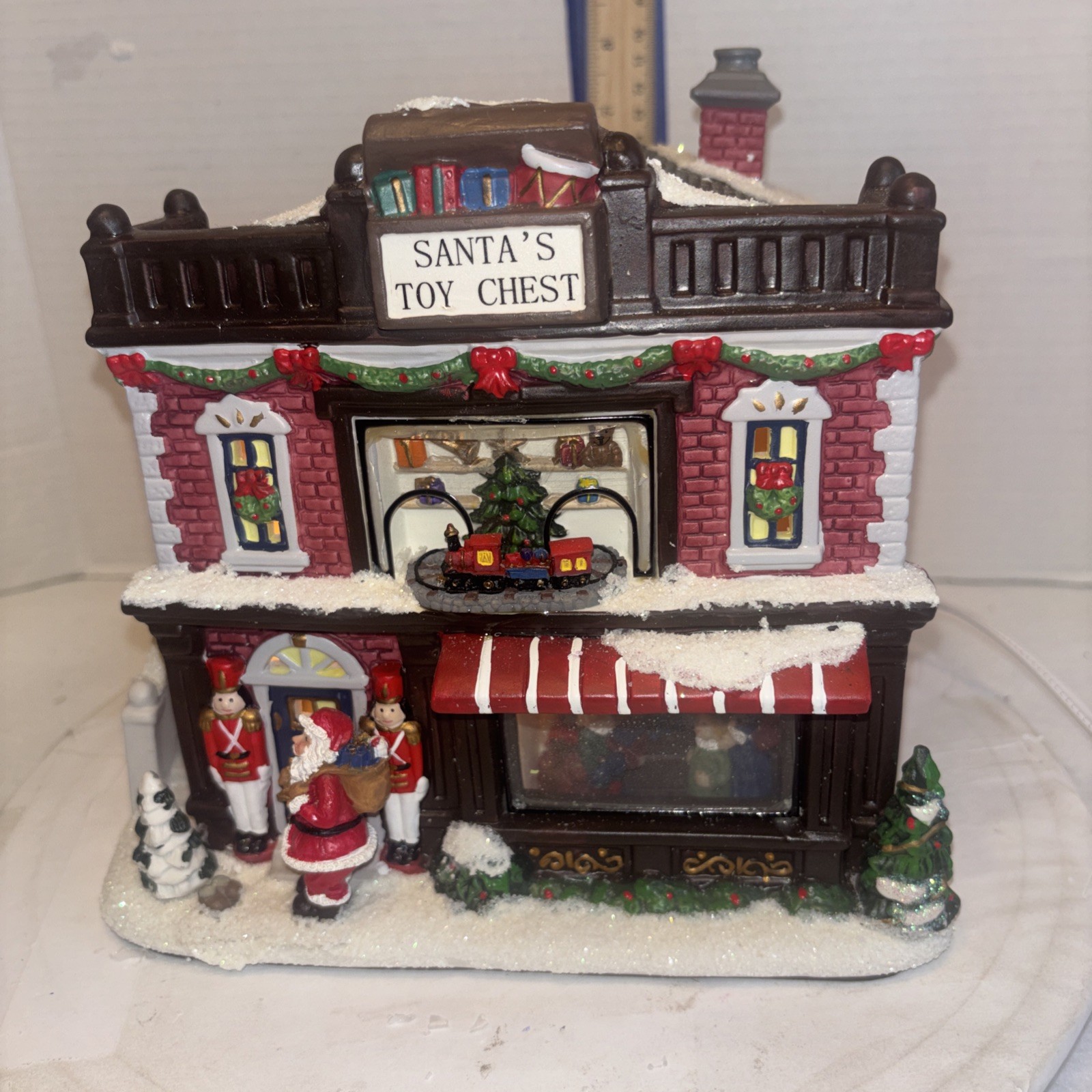 2010 St Nicholas Square Christmas Village Santa’s Toy Chest Illuminated