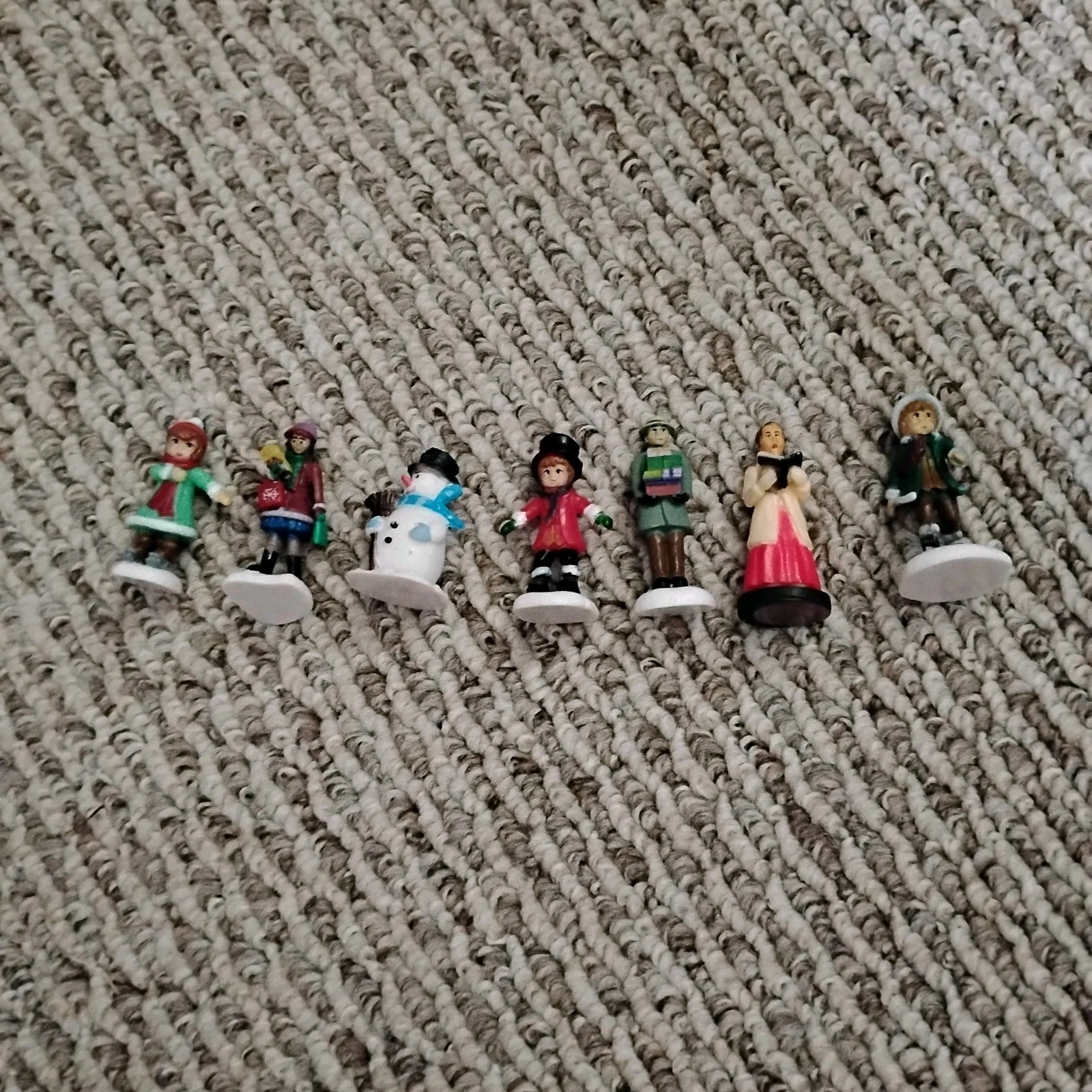 Lot of 7 Miniature Christmas Village Figurines Snowman Carolers People Resin