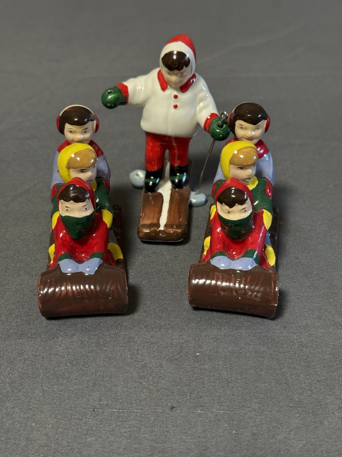 Dept 56 Vintage Christmas Skiers Figurines Set 3 Taiwan Sled Scene